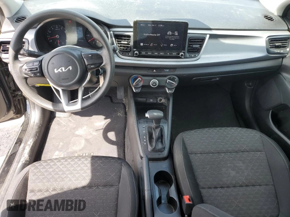 2023 Kia Rio LX with VIN 3KPA24AD7PE576869, listed as a Copart auction lot 50861285 with 18,044 mi miles and Salvage Title. Bid and sale history available at DreamBid. Image 8.