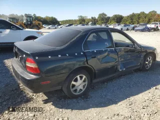 1995 Honda Accord EX with VIN 1HGCD5661SA012246, listed as a Copart auction lot 77007384 with 211,546 mi miles and Salvage Title. Bid and sale history available at DreamBid. Image 3.