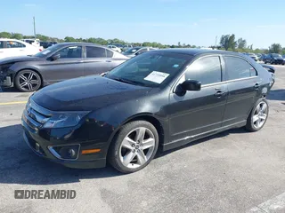 2012 Ford Fusion SPORT with VIN 3FAHP0KC7CR449210, listed as a IAAI auction lot 41722058 with 153,834 mi miles. Bid and sale history available at carsss.com. Image 2.