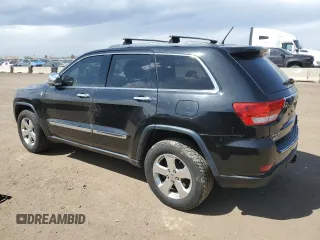 2013 Jeep Grand Cherokee Overland with VIN 1C4RJFCG5DC638927, listed as a Copart auction lot 52752615 with 117,494 mi miles and Salvage Title. Bid and sale history available at carsss.com. Image 2.