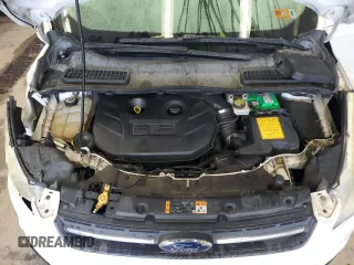 2013 Ford Escape SE z VIN 1FMCU9G96DUC02216, wystawiony jako Copart lot #63431115 z przebiegiem 186 614 mil mil oraz Szkoda całkowita • Salvage title. Historia ofert i sprzedaży dostępna na DreamBid. Obrazek 12.