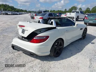 2013 Mercedes-Benz SLK 250 with VIN WDDPK4HA2DF056625, listed as a IAAI auction lot 42343051 with 96,615 mi miles and . Bid and sale history available at DreamBid. Image 4.