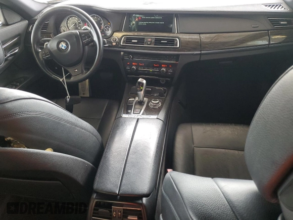 2013 BMW 7 Series 740i with VIN WBAYA6C5XDD143639, listed as a Copart auction lot 62296694 with 97,082 mi miles and Salvage Title. Bid and sale history available at carsss.com. Image 8.