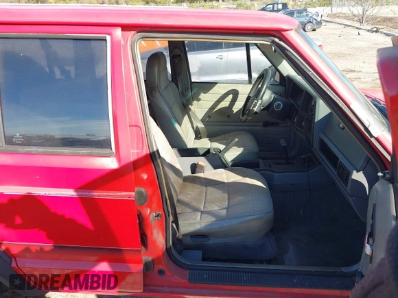 1996 Jeep Cherokee SE with VIN 1J4FT28S0TL225891, listed as a IAAI auction lot 41411705 with 233,983 mi miles and . Bid and sale history available at DreamBid. Image 5.