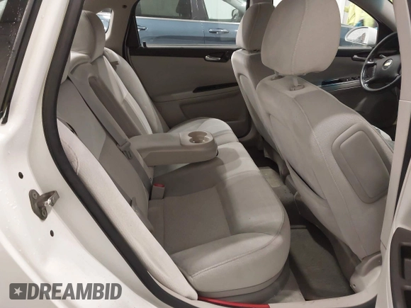 2014 Chevrolet Impala LT with VIN 2G1WB5E30E1140591, listed as a IAAI auction lot 41620447 with 186,226 mi miles and . Bid and sale history available at DreamBid. Image 8.