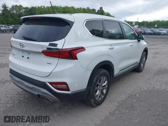 2019 Hyundai Santa Fe SE with VIN 5NMS2CAD9KH117777, listed as a IAAI auction lot 42296811 with 82,188 mi miles and . Bid and sale history available at DreamBid. Image 4.