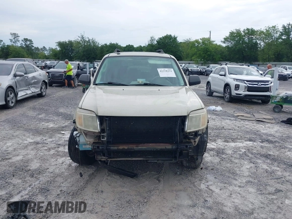 2011 Mercury Mariner z VIN 4M2CN8B72BKJ03915, wystawiony jako IAAI lot #42358251 z przebiegiem 169 206 mil mil oraz . Historia ofert i sprzedaży dostępna na DreamBid. Obrazek 12.