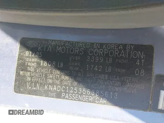 2005 Kia Rio with VIN KNADC125356385613, listed as a IAAI auction lot 41841381 with 91,273 mi miles. Bid and sale history available at carsss.com. Image 9.