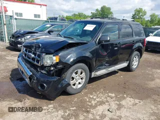 2010 Ford Escape Limited with VIN 1FMCU9E75AKD36580, listed as a IAAI auction lot 42335561 with 164,565 mi miles and . Bid and sale history available at DreamBid. Image 2.