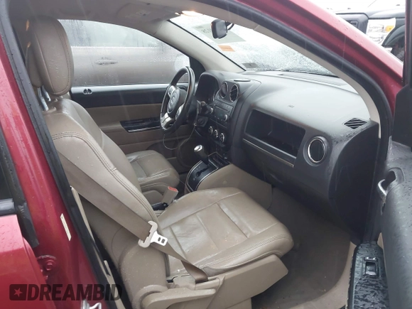 2011 Jeep Compass Limited with VIN 1J4NF5FB5BD169706, listed as a IAAI auction lot 41454128 with 146,267 mi miles. Bid and sale history available at carsss.com. Image 5.