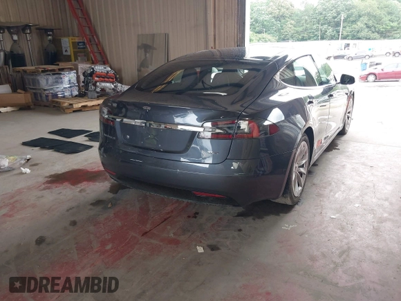 2018 Tesla Model S 75D with VIN 5YJSA1E28JF298208, listed as a IAAI auction lot 42438793 with Not provided miles and . Bid and sale history available at DreamBid. Image 4.