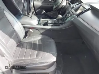 2015 Ford Taurus SHO with VIN 1FAHP2KT8FG202995, listed as a IAAI auction lot 41823964 with 79,720 mi miles and . Bid and sale history available at DreamBid. Image 5.