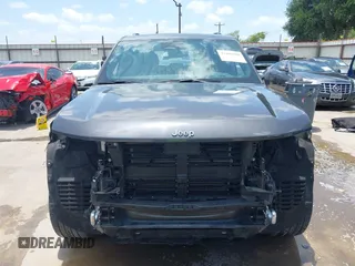 2022 Jeep Grand Cherokee Overland with VIN 1C4RJHDG6N8580874, listed as a IAAI auction lot 42498940 with 19,818 mi miles and . Bid and sale history available at DreamBid. Image 13.