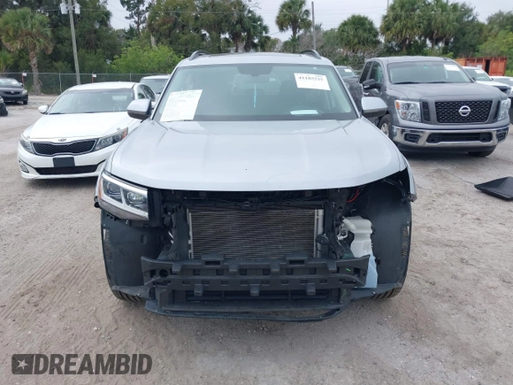 2021 Volkswagen Atlas SE with VIN 1V2JR2CA7MC556268, listed as a IAAI auction lot 41185525 with 73,724 mi miles and . Bid and sale history available at DreamBid. Image 13.
