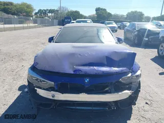 2020 BMW M4 with VIN WBS4Y9C09LFJ02627, listed as a IAAI auction lot 41785396 with 27,424 mi miles. Bid and sale history available at carsss.com. Image 6.