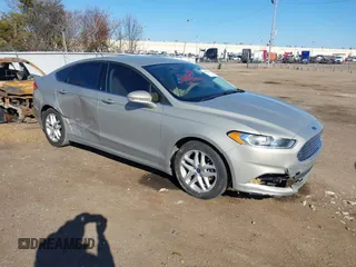 2015 Ford Fusion SE z VIN 3FA6P0H70FR101965, wystawiony jako IAAI lot #38293400 z przebiegiem 106 501 mil mil oraz . Historia ofert i sprzedaży dostępna na DreamBid. Obrazek 1.
