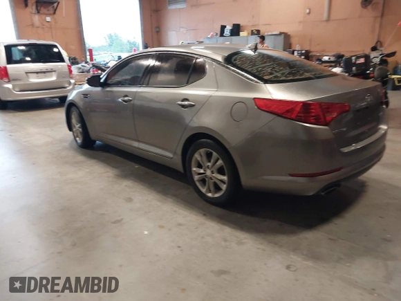 2013 Kia Optima EX with VIN 5XXGN4A74DG165525, listed as a IAAI auction lot 42405482 with 132,820 mi miles and . Bid and sale history available at DreamBid. Image 3.
