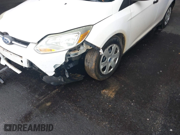 2012 Ford Focus S with VIN 1FAHP3E24CL254409, listed as a IAAI auction lot 42166880 with 123,981 mi miles and . Bid and sale history available at DreamBid. Image 6.