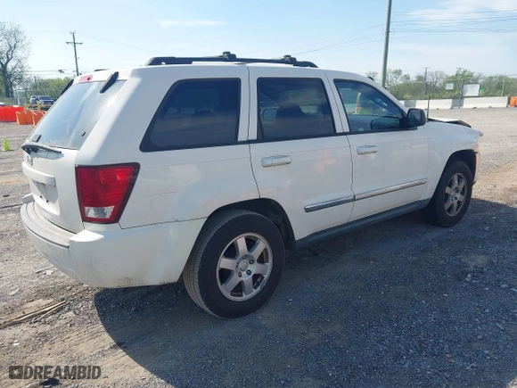 2010 Jeep Grand Cherokee Laredo with VIN 1J4PS4GK6AC112447, listed as a IAAI auction lot 42086245 with 150,875 mi miles. Bid and sale history available at carsss.com. Image 4.