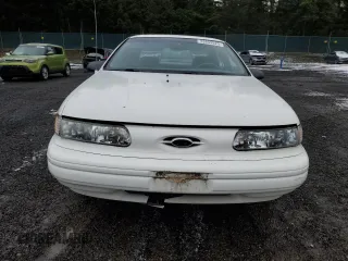 1994 Ford Taurus z VIN 1FALP5344RA291510, wystawiony jako Copart lot #43854925 z przebiegiem 69 067 mil mil oraz Tytuł czysty. Historia ofert i sprzedaży dostępna na DreamBid. Obrazek 5.