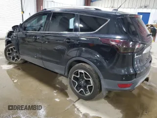 2015 Ford Escape Titanium with VIN 1FMCU9J91FUB77592, listed as a Copart auction lot 62727355 with 94,131 mi miles and Salvage title. Bid and sale history available at DreamBid. Image 2.