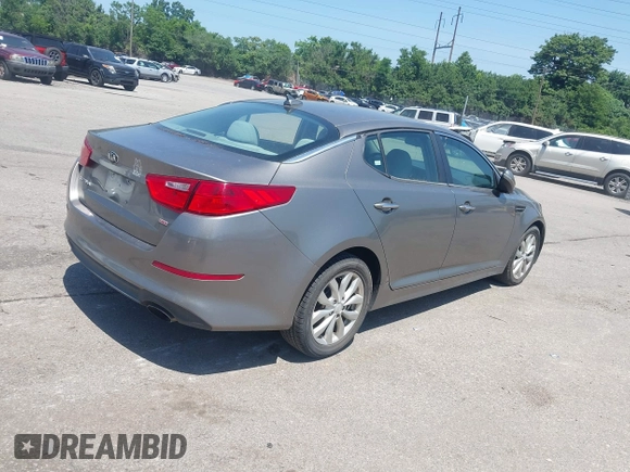 2015 Kia Optima LX with VIN 5XXGM4A75FG451244, listed as a IAAI auction lot 42582899 with 109,152 mi miles and . Bid and sale history available at DreamBid. Image 4.