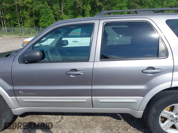 2007 Ford Escape Hybrid with VIN 1FMCU49H47KA90605, listed as a IAAI auction lot 42093591 with 136,924 mi miles and . Bid and sale history available at DreamBid. Image 14.