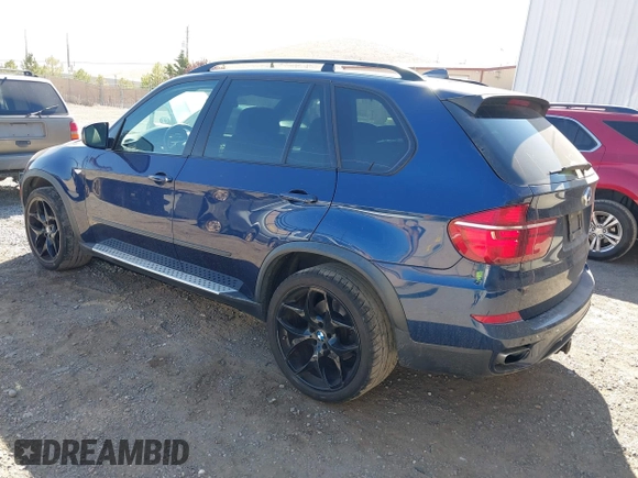 2012 BMW X5 50i with VIN 5UXZV8C57CL423223, listed as a IAAI auction lot 42606594 with 94,695 mi miles and . Bid and sale history available at DreamBid. Image 3.