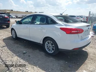2015 Ford Focus SE with VIN 1FADP3F2XFL335884, listed as a IAAI auction lot 42582740 with 102,036 mi miles and . Bid and sale history available at DreamBid. Image 3.