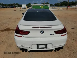 2014 BMW M6 z VIN WBSLX9C53ED160497, wystawiony jako Copart lot #62826444 z przebiegiem 55 639 mil mil oraz Szkody całkowita. Historia ofert i sprzedaży dostępna na DreamBid. Obrazek 6.