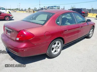 2002 Ford Taurus SE Standard with VIN 1FAFP53U92G230248, listed as a IAAI auction lot 42580676 with 122,118 mi miles and . Bid and sale history available at DreamBid. Image 4.