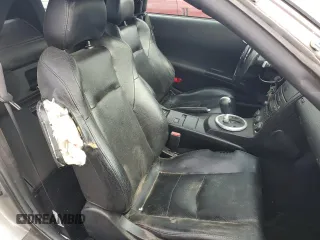 2004 Nissan 350Z Touring z VIN JN1AZ36A44M253626, wystawiony jako Copart lot #79089504 z przebiegiem 138 345 mil mil oraz Szkoda całkowita • Salvage title. Historia ofert i sprzedaży dostępna na DreamBid. Obrazek 10.