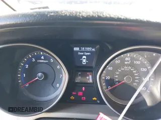 2014 Hyundai Elantra GT with VIN KMHD35LH5EU171569, listed as a IAAI auction lot 41882896 with 181,989 mi miles. Bid and sale history available at carsss.com. Image 7.