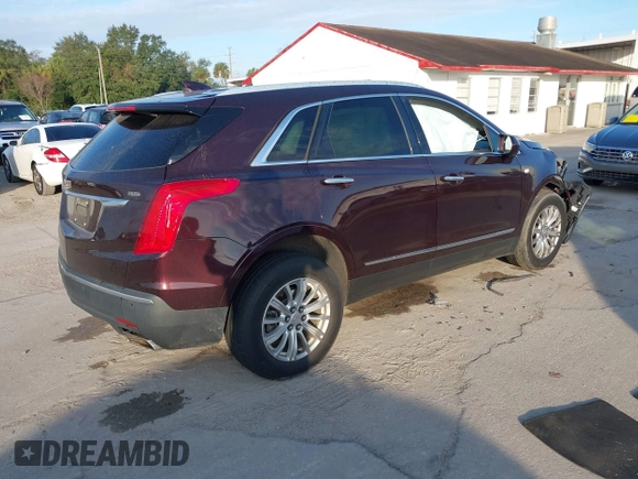 2018 Cadillac XT5 FWD with VIN 1GYKNARS6JZ179706, listed as a IAAI auction lot 41195570 with 80,676 mi miles. Bid and sale history available at carsss.com. Image 4.