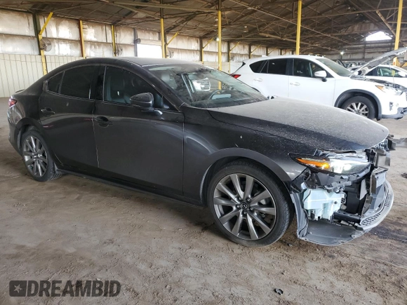 2021 Mazda 3 Premium with VIN JM1BPADL1M1305537, listed as a Copart auction lot 50722545 with 66,182 mi miles and Salvage title. Bid and sale history available at DreamBid. Image 4.
