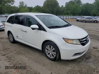 2014 Honda Odyssey EX-L with VIN 5FNRL5H63EB079306, listed as a Copart auction lot 57170635 with 256,140 mi miles and Clean title. Bid and sale history available at DreamBid. Image 4.