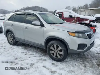 2013 Kia Sorento LX with VIN 5XYKTDA26DG338980, listed as a IAAI auction lot 41270994 with 170,714 mi miles. Bid and sale history available at carsss.com. Image 1.