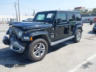 2020 Jeep Wrangler Unlimited Sahara with VIN 1C4HJXEN6LW235159, listed as a IAAI auction lot 42045083 with 68,400 mi miles and . Bid and sale history available at DreamBid. Image 17.