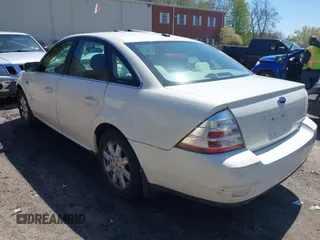 2009 Ford Taurus SE with VIN 1FAHP23W89G113022, listed as a IAAI auction lot 42118187 with 135,319 mi miles. Bid and sale history available at carsss.com. Image 3.