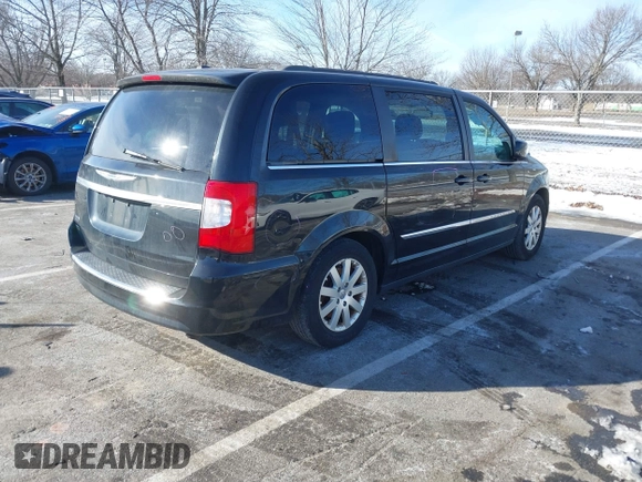 2016 Chrysler Town & Country Touring with VIN 2C4RC1BG7GR231704, listed as a IAAI auction lot 41306140 with 165,890 mi miles. Bid and sale history available at carsss.com. Image 4.
