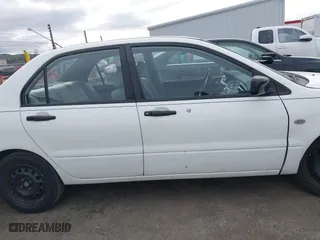 2004 Mitsubishi Lancer ES with VIN JA3AJ26E74U060371, listed as a IAAI auction lot 41636927 with 165,456 mi miles. Bid and sale history available at carsss.com. Image 13.