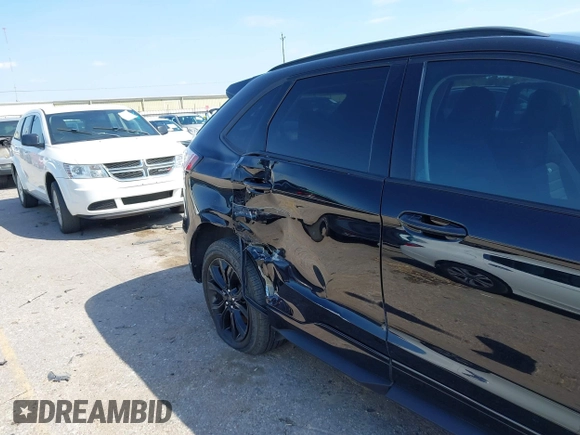 2023 Ford Edge SE z VIN 2FMPK4G90PBA05532, wystawiony jako IAAI lot #41845991 z przebiegiem 39 568 mil mil oraz . Historia ofert i sprzedaży dostępna na DreamBid. Obrazek 6.