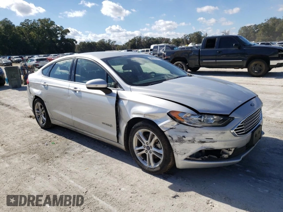 2018 Ford Fusion Hybrid SE with VIN 3FA6P0LU6JR235451, listed as a Copart auction lot 36202453 with 116,180 mi miles. Bid and sale history available at carsss.com. Image 4.