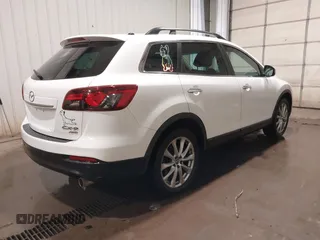 2014 Mazda CX-9 Grand Touring with VIN JM3TB3DA7E0428187, listed as a IAAI auction lot 41247569 with 117,590 mi miles and . Bid and sale history available at DreamBid. Image 4.