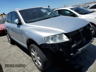 2004 Volkswagen Touareg z VIN WVGCM77L74D059969, wystawiony jako Copart lot #68238193 z przebiegiem Nie podano mil oraz Szkody całkowita. Historia ofert i sprzedaży dostępna na DreamBid. Obrazek 4.