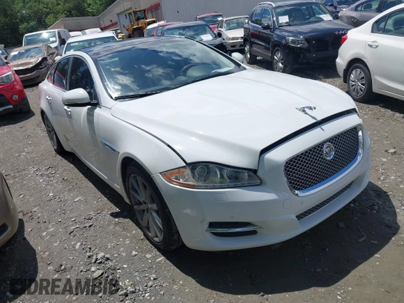 2015 Jaguar XJ with VIN SAJWA1CZ0F8V75119, listed as a IAAI auction lot 42248663 with 94,060 mi miles and . Bid and sale history available at DreamBid. Image 1.