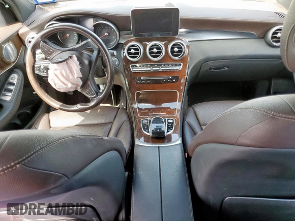 2017 Mercedes-Benz GLC 300 with VIN WDC0G4JB2HF130125, listed as a Copart auction lot 61576685 with 94,643 mi miles and Salvage title. Bid and sale history available at DreamBid. Image 4.