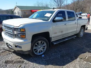 2014 Chevrolet Silverado 1500 High Country with VIN 3GCUKTEJ7EG372338, listed as a IAAI auction lot 41849096 with 69,010 mi miles and . Bid and sale history available at DreamBid. Image 2.