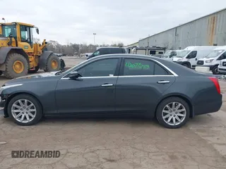 2015 Cadillac CTS AWD z VIN 1G6AW5SX6F0116891, wystawiony jako IAAI lot #42077259 z przebiegiem 119 426 mil mil oraz . Historia ofert i sprzedaży dostępna na DreamBid. Obrazek 14.
