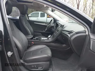 2016 Ford Fusion Titanium with VIN 3FA6P0K90GR273795, listed as a IAAI auction lot 41931175 with 108,531 mi miles and . Bid and sale history available at carsss.com. Image 5.